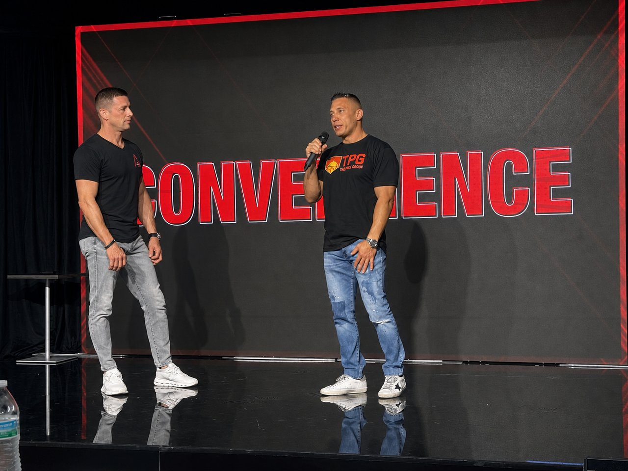 TPG leadership speaking on stage at the annual agent convention
